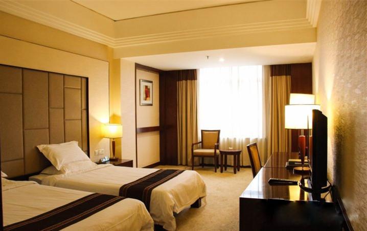 Guangzhou Huadu New Phoenix Hotel Номер фото